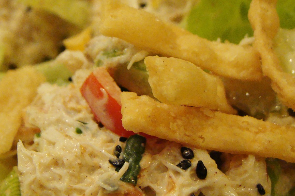 Ginger soy chicken lettuce wraps topped with crispy noodles